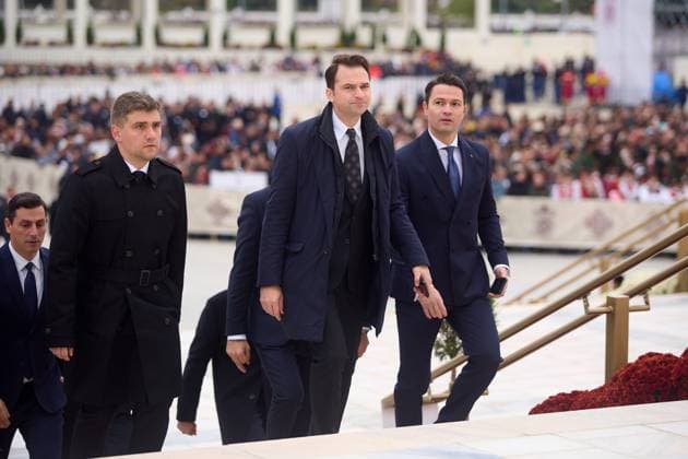 Worlds Largest Orthodox Cathedral, Icons Consecration, Bucharest, Romania Bucharest, Romania. 26th Oct, 2025: (L-R) Eduard Tatian Mititelu, Sebastian Burduja and Robert Sighiartau, deputies of the National Liberal Party, arrive at the Romanian National Cathedral to attend the consecration of the interior mosaic icons of the Cathedral, an event marking the centennial of the Romanian Orthodox Patriarchate and 140 years of Autocephaly. First proposed in 1881 during the reign of King Carol I, it has been under construction since 2010 and stands today as the largest Orthodox Cathedral in the world, dominating Bucharest with its over 130 meters height. Bucharest Romania Copyright: xLucianxAlecux