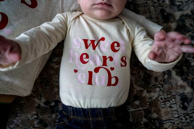 Baby Girl in Sweethearts Club Bodysuit for Valentine?s Day Saint Paul, Minnesota, United States R_MZGL251025-1861691-01 ,model released, Symbolfoto