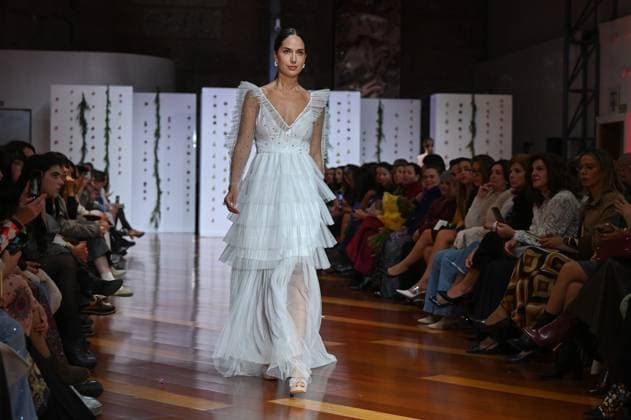 October 28, 2025, Madrid, Spain: A model showcases creations by Laura Lomas during the Atelier Couture bridal catwalk within Madrid Fashion Week, at Fabrica de Tapices in Madrid. Madrid Spain - ZUMAs197 20251028_aaa_s197_208 Copyright: xAtilanoxGarciax