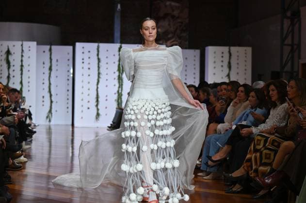 October 28, 2025, Madrid, Spain: A model showcases creations by Senorito Ortega during the Atelier Couture bridal catwalk within Madrid Fashion Week, at Fabrica de Tapices in Madrid. Madrid Spain - ZUMAs197 20251028_aaa_s197_226 Copyright: xAtilanoxGarciax