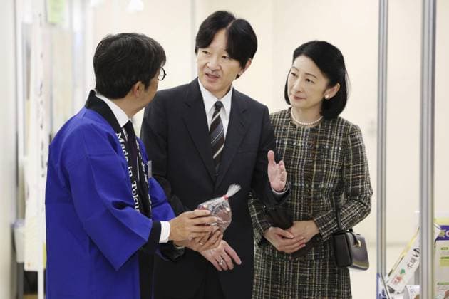 Crown prince visits food festival in Tokyo Japanese Crown Prince Fumihito (C) and Crown Princess Kiko visit a farm and marine food festival in Tokyo on Oct. 31, 2025. (Pool photo)  A14AA0004993677P