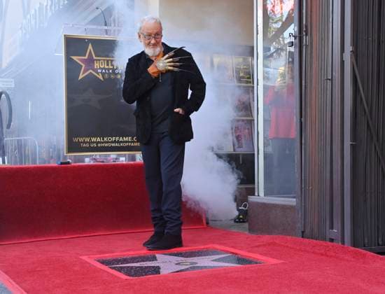 American actor and director Robert Englund, who is best known for his portrayal of the villainous Freddie Krueger stands over his star during an unveiling ceremony honoring him with the 2, 826th star on the Hollywood Walk of Fame in Los Angeles on Friday, October 31, 2025.  LAP2025103105 JIMxRUYMEN