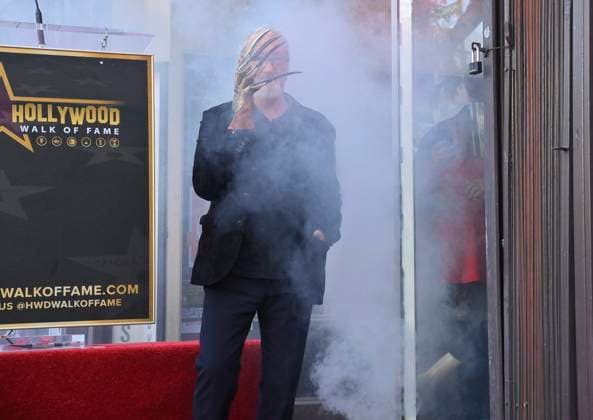 American actor and director Robert Englund, who is best known for his portrayal of the villainous Freddie Krueger stands over his star during an unveiling ceremony honoring him with the 2, 826th star on the Hollywood Walk of Fame in Los Angeles on Friday, October 31, 2025.  LAP2025103108 JIMxRUYMEN