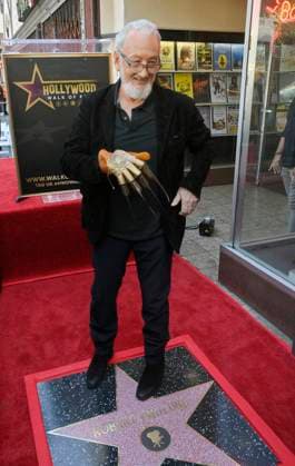 American actor and director Robert Englund, who is best known for his portrayal of the villainous Freddie Krueger stands on his star during an unveiling ceremony honoring him with the 2, 826th star on the Hollywood Walk of Fame in Los Angeles on Friday, October 31, 2025.  LAP20251031135 JIMxRUYMEN