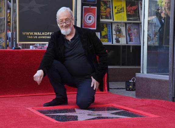 American actor and director Robert Englund, who is best known for his portrayal of the villainous Freddie Krueger kneels next to his star during an unveiling ceremony honoring him with the 2, 826th star on the Hollywood Walk of Fame in Los Angeles on Friday, October 31, 2025.  LAP2025103115 JIMxRUYMEN