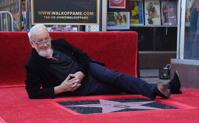 American actor and director Robert Englund, who is best known for his portrayal of the villainous Freddie Krueger lies next to his star during an unveiling ceremony honoring him with the 2, 826th star on the Hollywood Walk of Fame in Los Angeles on Friday, October 31, 2025.  LAP2025103117 JIMxRUYMEN