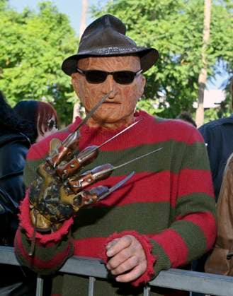 A man dressed as the Freddy Krueger joins hundreds of fans during an unveiling ceremony honoring American actor and director Robert Englund, who is best known for his portrayal of the villainous Freddie Krueger, with the 2, 826th star on the Hollywood Walk of Fame in Los Angeles on Friday, October 31, 2025.  LAP2025103139 JIMxRUYMEN