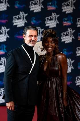 PEOPLE : NRJ Music Awards - Cannes 31 10 25 Patrick Mouratoglou and Ada attend the 27th NRJ Music Awards on October 31, 2025 in Cannes, France. Photo by Sandrine Thesillat PsNewZ  Copyright: xSandrinexTHESILLATx