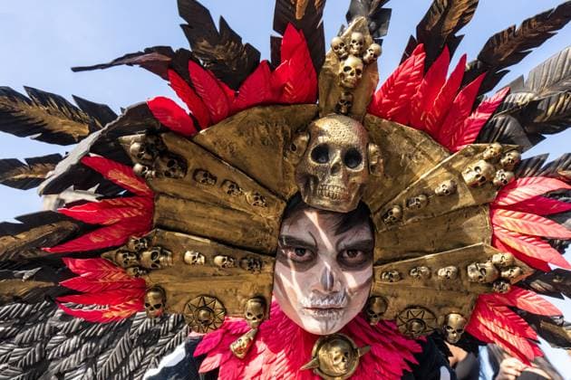 Day Of The Dead In Mexico City s Historic Center A child with skull face paint and a traditional costume is seen during a Day of the Dead celebration in the Zocalo, the historic center of Mexico City, Mexico. Day of the Dead honors deceased loved ones with altars, marigolds, skull face paint, and offerings meant to guide returning spirits. The Zocalo, officially Plaza de la Constitucion, is Mexico City s main square and serves as the political and cultural heart of the capital since Aztec times. Mexico City Mexico Mexico  Copyright: xRonenxTivonyx originalFilename: tivony-dayofthe251031_np5eL.jpg