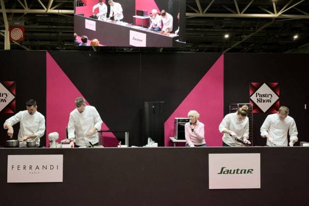 Salon Du Chocolat - Chefs from Le Bristol Chefs from Le Bristol : Johan Giacchetti Chef Chocolat maker (L), Maxence Barbot, Pastry Chef (R) for VoilaChef , Mercotte and students from Ferrandi Cook School executing the receipe, during the Pastry Show of the 30rd Salon Du Chocolat Et De La Patisserie - Chocolate Fair held at Parc des Expositions Porte de Versailles on October 31, 2025 in Paris, France.Photo by Jana Call me J ABACAPRESS.COM Paris Ile de France France  Copyright: xJanaxCallxmexJ ABACAx