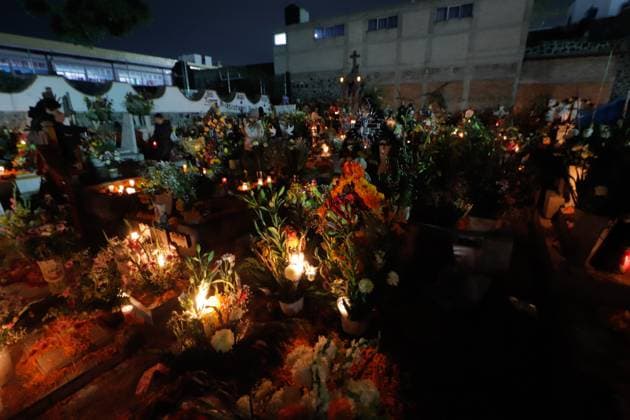 People Visit San Andres Mixquic cemetery on Dia de Muertos Celebration People visit the San Andres Mixquic cemetery, located in Tlahuac, to accompany their deceased loved ones in the traditional lighting ceremony on the Dia de Muertos celebration. on October 3, 2025 in Mexico City, Mexico. (Photo by Carlos Santiago Eyepix Group) Copyright: xCarlosxSantiagox xEyepixxGroupx CS_03112025_172435