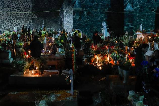 People Visit San Andres Mixquic cemetery on Dia de Muertos Celebration People visit the San Andres Mixquic cemetery, located in Tlahuac, to accompany their deceased loved ones in the traditional lighting ceremony on the Dia de Muertos celebration. on October 3, 2025 in Mexico City, Mexico. (Photo by Carlos Santiago Eyepix Group) Copyright: xCarlosxSantiagox xEyepixxGroupx CS_03112025_172436