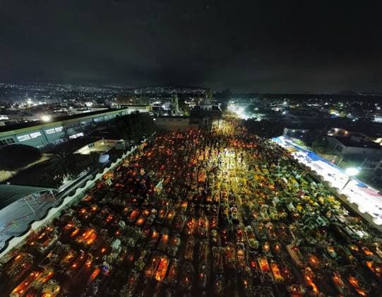 People Visit San Andres Mixquic cemetery on Dia de Muertos Celebration Aerial view of the San Andres Mixquic cemetery, located in Tlahuac, where people accompany their deceased loved ones in the traditional lighting ceremony on the Dia de Muertos celebration. on October 3, 2025 in Mexico City, Mexico. (Photo by Carlos Santiago Eyepix Group) Copyright: xCarlosxSantiagox xEyepixxGroupx CS_03112025_172467