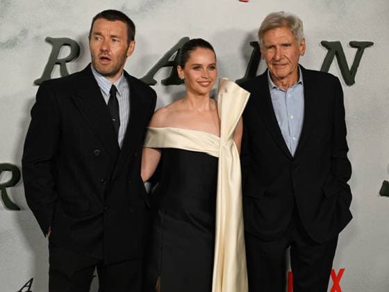 November 3, 2025, Hollywood, California, USA: Australian actor, writer, director, and producer JOEL EDGERTON, English actress FELICITY JONES and American actor HARRISON FORD attend the Los Angeles Premiere Of Netflix s Train Dreams Hollywood USA - ZUMAb173 20251103_aap_b173_012 Copyright: xBillyxBennightx