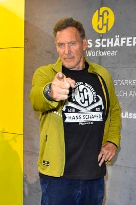 abb Moeller Ralf Rudolf Moeller Möller the German actor ambassador of the Initiative Handwerk and former bodybuilder and Mr Universe is advertising as a guest star at the Hans Schaefer Workwear workwear stand at the A plus A exhibition at the Duesseldorf trade fair on 04 11 2025 in Duesseldorf NRW Germany