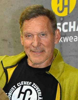 abb Moeller Ralf Rudolf Moeller Möller the German actor ambassador of the Initiative Handwerk and former bodybuilder and Mr Universe is advertising as a guest star at the Hans Schaefer Workwear workwear stand at the A plus A exhibition at the Duesseldorf trade fair on 04 11 2025 in Duesseldorf NRW Germany