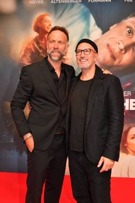 Director Erik Schmitt and Benno Fuermann at the Das Leben der Wuensche film premiere on 4 11 2025 at the Mathaeser Filmpalast in Munich Matthias Schweighoefers Das Leben der Wuensche film premiere in Munich