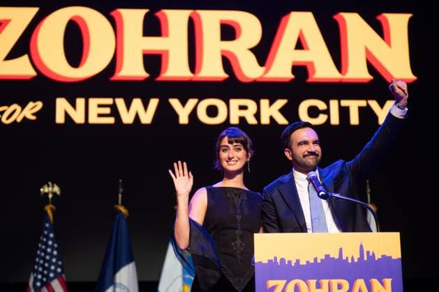 Mayor-elect Zohran Mamdani and his wife Rama Duwaji greet supporters at an election night watch party after winning the New York City mayoral race on Tuesday, November 4, 2025, at the Brooklyn Paramount Theater in New York City.  NYP20251104919 DEREKxFRENCH