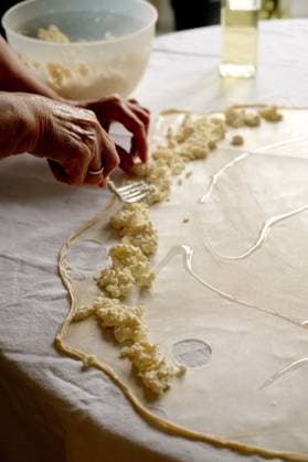 Granny s hands cooking cottage cheese pie Corby, England, United Kingdom R_ATMT250507A-1720109-01