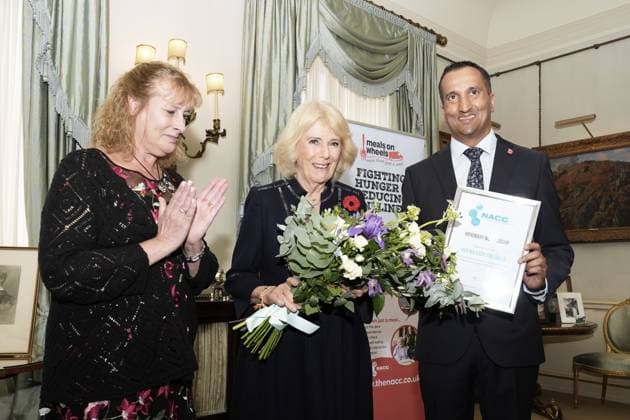 Community volunteering celebration Queen Camilla (centre) is made an honorary member of the National Association of Care Catering (NACC), at an event to celebrate community volunteering during Meals on Wheels Week, at Clarence House in central London. Picture date: Wednesday November 5, 2025., Credit:Jordan Pettitt Avalon UK, London  Copyright: xJordanxPettittx xAvalonx 1050493327