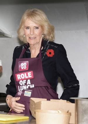 Community volunteering celebration Queen Camilla with Spudman (not pictured) as he delivers jacket potatoes in a Royal Voluntary Service food truck, as she hosts members of the National Association of Care Catering (NACC), and representatives from Royal Voluntary Service (RVS) in a celebration of community volunteering during Meals on Wheels Week, at Clarence House in central London. Picture date: Wednesday November 5, 2025., Credit:Jordan Pettitt Avalon UK, London  Copyright: xJordanxPettittx xAvalonx 1050493389