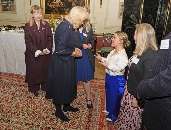 Community volunteering celebration Queen Camilla speaks to Ellie Simmonds, as she hosts members of the National Association of Care Catering (NACC), and representatives from Royal Voluntary Service (RVS) in a celebration of community volunteering during Meals on Wheels Week, at Clarence House in central London. Picture date: Wednesday November 5, 2025., Credit:Jordan Pettitt Avalon UK, London  Copyright: xJordanxPettittx xAvalonx 1050498319