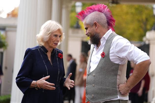 Community volunteering celebration Queen Camilla meets Spudman as he delivers jacket potatoes in a Royal Voluntary Service food truck, as she hosts members of the National Association of Care Catering (NACC), and representatives from Royal Voluntary Service (RVS) in a celebration of community volunteering during Meals on Wheels Week, at Clarence House in central London. Picture date: Wednesday November 5, 2025., Credit:Jordan Pettitt Avalon UK, London  Copyright: xJordanxPettittx xAvalonx 1050498422