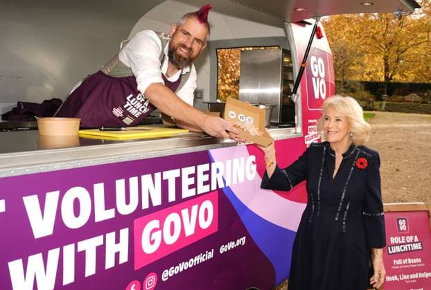 Community volunteering celebration Queen Camilla meets Spudman as he delivers jacket potatoes in a Royal Voluntary Service food truck, as she hosts members of the National Association of Care Catering (NACC), and representatives from Royal Voluntary Service (RVS) in a celebration of community volunteering during Meals on Wheels Week, at Clarence House in central London. Picture date: Wednesday November 5, 2025., Credit:Jordan Pettitt Avalon UK, London  Copyright: xJordanxPettittx xAvalonx 1050498442