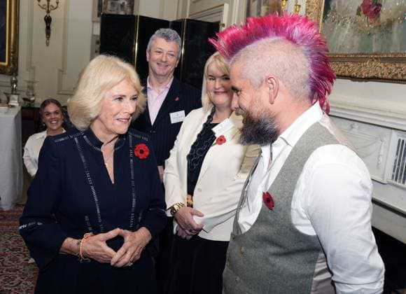 . 05 11 2025. London, United Kingdom. Queen Camilla with social media star ÔSpudmanÕ as she hosts a reception to celebrate community volunteering at Clarence House in London.  xPoolx xi-Imagesx IIM-26355-0011