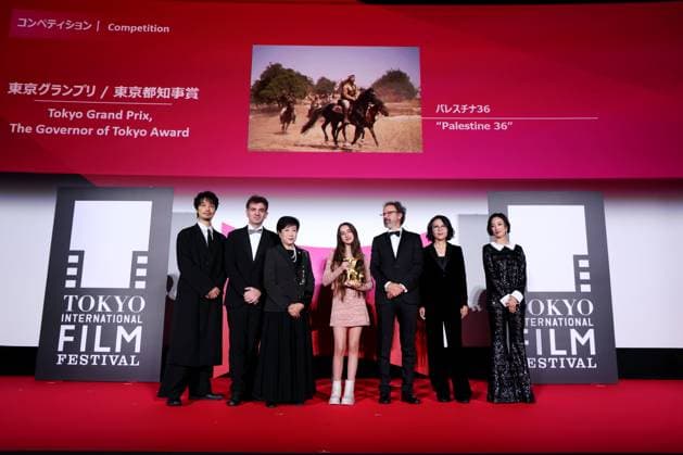 Takumi Saito, Matthieu Laclau, Yuriko Koike, Wardi Eilabouni, Carlo Chatrian, Vivian Qu, Gwey Lun-Mei, November 05, 2025 - Takumi Saito, Matthieu Laclau, Yuriko Koike, Wardi Eilabouni, Carlo Chatrian, Vivian Qu, Gwey Lun-Mei, speak after winning Tokyo Grand Prix The Governor of Tokyo Award for the film Palestine 36 during the 38th Tokyo International Film Festival. award ceremony, in Tokyo, Japan on November 05, 2025. aflo_309478938