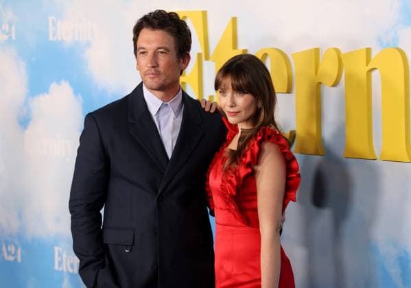 Miles Teller and Elizabeth Olsen attend the Los Angeles Special Screening of A24 s Eternity at the AMC Century City 15 in Los Angeles, CA on Wednesday, November 5, 2025. Storyline: In an afterlife where souls have one week to decide where to spend eternity, Joan is faced with the impossible choice between the man she spent her life with and her first love, who died young and has waited decades for her to arrive.  LAP20251105847 GREGxGRUDT