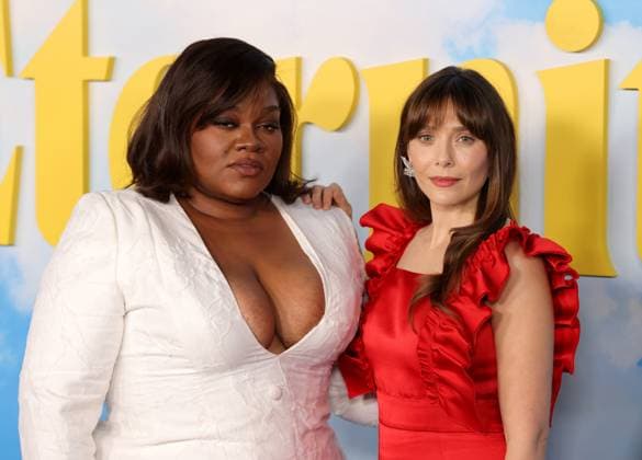 Da Vine Joy Randolph and Elizabeth Olsen attend the Los Angeles Special Screening of A24 s Eternity at the AMC Century City 15 in Los Angeles, CA on Wednesday, November 5, 2025. Storyline: In an afterlife where souls have one week to decide where to spend eternity, Joan is faced with the impossible choice between the man she spent her life with and her first love, who died young and has waited decades for her to arrive.  LAP20251105857 GREGxGRUDT