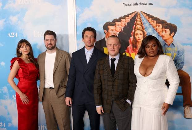 Elizabeth Olsen, David Freyne, Miles Teller, John Early and Da Vine Joy Randolph attend the Los Angeles Special Screening of A24 s Eternity at the AMC Century City 15 in Los Angeles, CA on Wednesday, November 5, 2025. Storyline: In an afterlife where souls have one week to decide where to spend eternity, Joan is faced with the impossible choice between the man she spent her life with and her first love, who died young and has waited decades for her to arrive.  LAP20251105862 GREGxGRUDT
