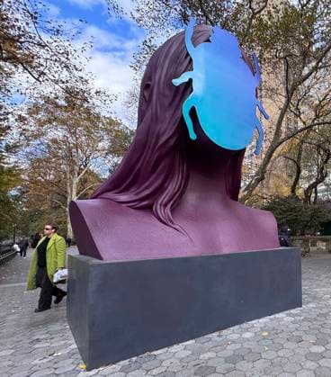 November 6, 2025, New York, New York, USA: A view of the public sculpture First Sun by Kuwaiti artist Monira Al Qadiri seen on display in Central Park, at the Doris C. Freedman Plaza. The 17-foot-tall painted aluminum sculpture is inspired by the ancient Egyptian deity Khepri reimaged as a contemporary monument. New York USA - ZUMAk03_ 20251106_zaf_k03_066 Copyright: xNancyxKaszermanx
