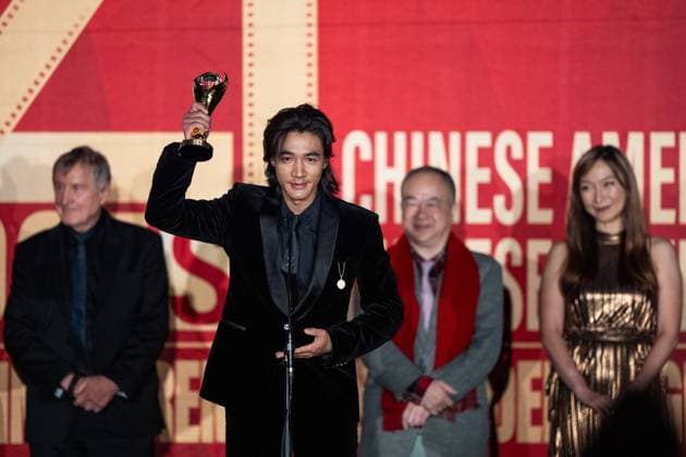 LOS ANGELES, CA - NOVEMBER 06: Actor Ci Sha (L2) poses with trophy during the Golden Angel Awards Ceremony of the 2025 Chinese American Film Festival (CAFF) and the Chinese American Television Festival (CATF) on November 6, 2025 in Los Angeles, California.  Copyright: xVCGx 111602455481