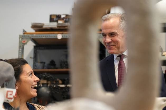 November 7, 2025, Toronto, On, CANADA: Prime Minister Mark Carney is seen framed through a sculpture as he tours the Harbourfront Centre in Toronto, Friday, Nov. 7, 2025. Toronto CANADA  - ZUMAc35_ 20251107_zaf_c35_013 Copyright: xNathanxDenettex
