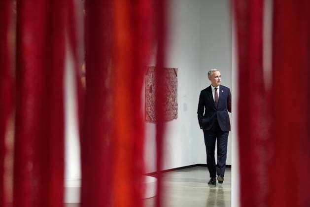 November 7, 2025, Toronto, On, CANADA: Prime Minister Mark Carney is pictured through a piece of textile art as he tours the Harbourfront Centre in Toronto, Friday, Nov. 7, 2025. Toronto CANADA  - ZUMAc35_ 20251107_zaf_c35_018 Copyright: xNathanxDenettex