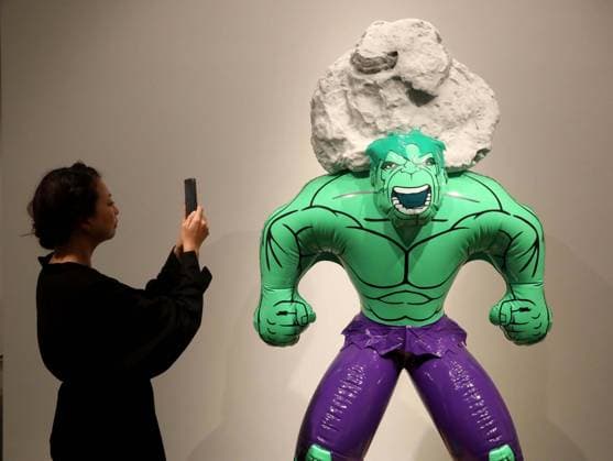 November 7, 2025, New York, New York, USA: A woman takes a cellphone photo of Hulk (Rock) by artist Jeff Koons, estimate $2 million - $3 million, during November Marquee Week 2025 during SothebyÃ¢â‚¬â ¢s Opening of the New Global Headquarters at the Breuer. New York USA - ZUMAk03_ 20251107_zaf_k03_068 Copyright: xNancyxKaszermanx