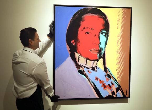 November 7, 2025, New York, New York, USA: A handler seen with The American Indian (Russell Means), 1977, by Andy Warhol, estimate $2 million - $3 million, during November Marquee Week 2025 during SothebyÃ¢â‚¬â ¢s Opening of the New Global Headquarters at the Breuer. New York USA - ZUMAk03_ 20251107_zaf_k03_073 Copyright: xNancyxKaszermanx