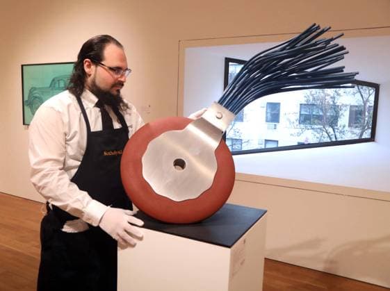 November 7, 2025, New York, New York, USA: A handler seen with Typewriter Eraser, 1977 by artist Claes Oldenburg, estimate $350,000 - $ 550,000 during November Marquee Week 2025 during SothebyÃ¢â‚¬â ¢s Opening of the New Global Headquarters at the Breuer. New York USA - ZUMAk03_ 20251107_zaf_k03_081 Copyright: xNancyxKaszermanx
