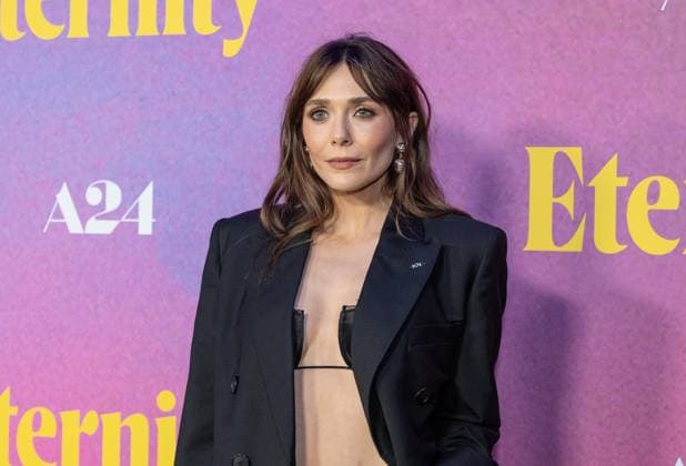 November 8, 2025, Bronx, New York, USA: Elizabeth Olsen wearing dress by Givenchy attends Eternity premiere at Regal Union Square in New York, NY on November 8, 2025. Bronx USA - ZUMAr339 20251108_znp_r339_023 Copyright: xLevxRadinx