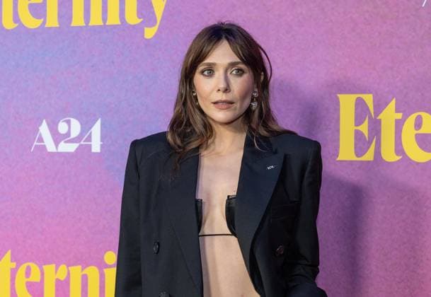 November 8, 2025, Bronx, New York, USA: Elizabeth Olsen wearing dress by Givenchy attends Eternity premiere at Regal Union Square in New York, NY on November 8, 2025. Bronx USA - ZUMAr339 20251108_znp_r339_022 Copyright: xLevxRadinx