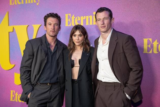 November 8, 2025, Bronx, New York, USA: Miles Teller, Elizabeth Olsen and Callum Turner attend Eternity premiere at Regal Union Square in New York, NY on November 8, 2025. Bronx USA - ZUMAr339 20251108_znp_r339_060 Copyright: xLevxRadinx
