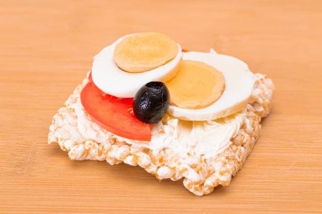 Rice Cake Sandwich with Tomato, Eggs and Olives Rice Cake Sandwich with Tomato, Eggs and Olives on Bamboo Cutting Board. Easy Breakfast. Diet Food. Quick and Healthy Sandwiches. Crispbread with Tasty Filling. Healthy Dietary Snack, 62626816.jpg RECORD DATE NOT STATED
