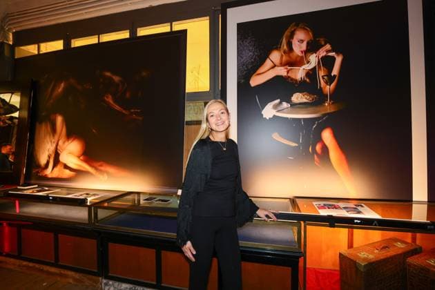 GLAMOUR GENUSS EVENT by Wildhagen Friends, Miriam Pracht in front of two photographic artworks by her father Urlich Pracht, EUR 5,934 each Der Schmücker Düsseldorf Wandelhalle NRW Germany