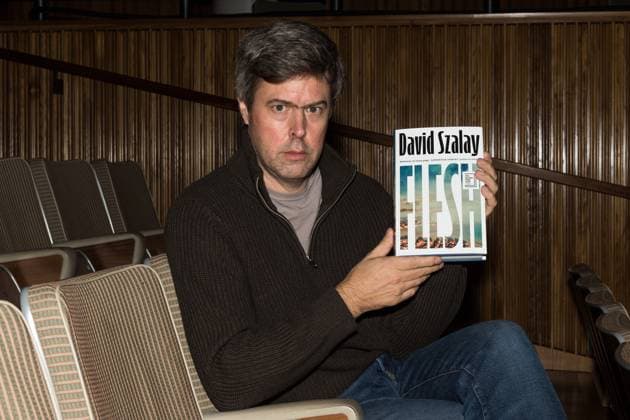 November 9, 2025, London, England, United Kingdom: Hungarian-British author DAVID SZALAY poses with his book Ã¢â‚¬ËœFleshÃ¢â‚¬â ¢ shortlisted for the Booker Prize 2025 during a photocall ahead of a reading event at Southbank Centre. The winner of the Booker Prize 2025 will be announced on Monday, 10 November at a ceremony in London, and the winning author will receive Ã‚Â£50,000. London United Kingdom - ZUMAs371 20251109_zip_s371_137 Copyright: xWiktorxSzymanowiczx