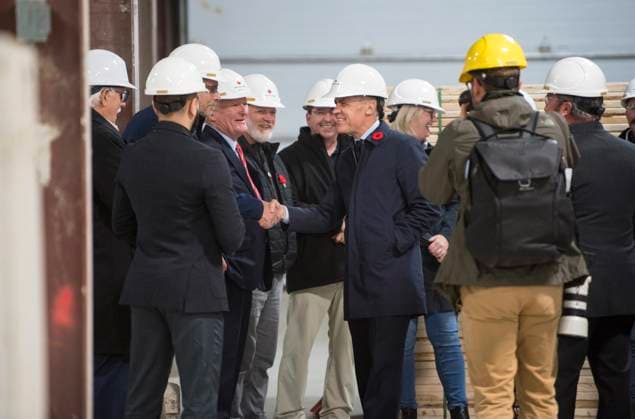 November 10, 2025, Fredericton, Nb, Canada: Prime Minister Mark Carney center, is greeted as he arrives for a tour of the manufacturing facility of Maple Leaf Homes in Fredericton, N.B., on Monday, Nov. 10, 2025. Fredericton Canada  - ZUMAc35_ 20251110_zaf_c35_053 Copyright: xStephenxMacgillivrayx