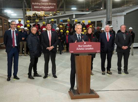 November 10, 2025, Fredericton, Nb, Canada: Prime Minister Mark Carney makes an announcement at the manufacturing facility of Maple Leaf Homes in Fredericton, N.B., on Monday, Nov. 10, 2025. Behind Carney from left are: David Myles, MP for Fredericton-Oromocto, Wayne Long, MP for Saint-John-Kennebecasis, Dominic LeBlanc, MP for Beauso jour, Erika Jones, president of Maple Leaf Homes, Bill Jones, chairman, and Chris McLean, general manager. Fredericton Canada - ZUMAc35_ 20251110_zaf_c35_054 Copyright: xStephenxMacgillivrayx
