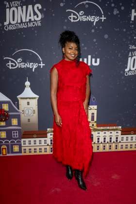 November 10, 2025, New York, United States: Adrienne Warren attends Disney+ s A Very Jonas Christmas Movie New York Premiere at New York City Center. New York United States - ZUMAs197 20251110_aaa_s197_387 Copyright: xRonxAdarx