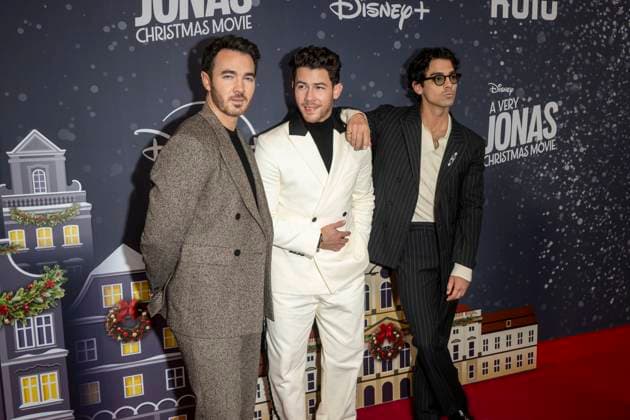 November 10, 2025, New York, United States: (L-R) Kevin Jonas, Nick Jonas and Joe Jonas attend Disney+ s A Very Jonas Christmas Movie New York Premiere at New York City Center. New York United States - ZUMAs197 20251110_aaa_s197_406 Copyright: xRonxAdarx